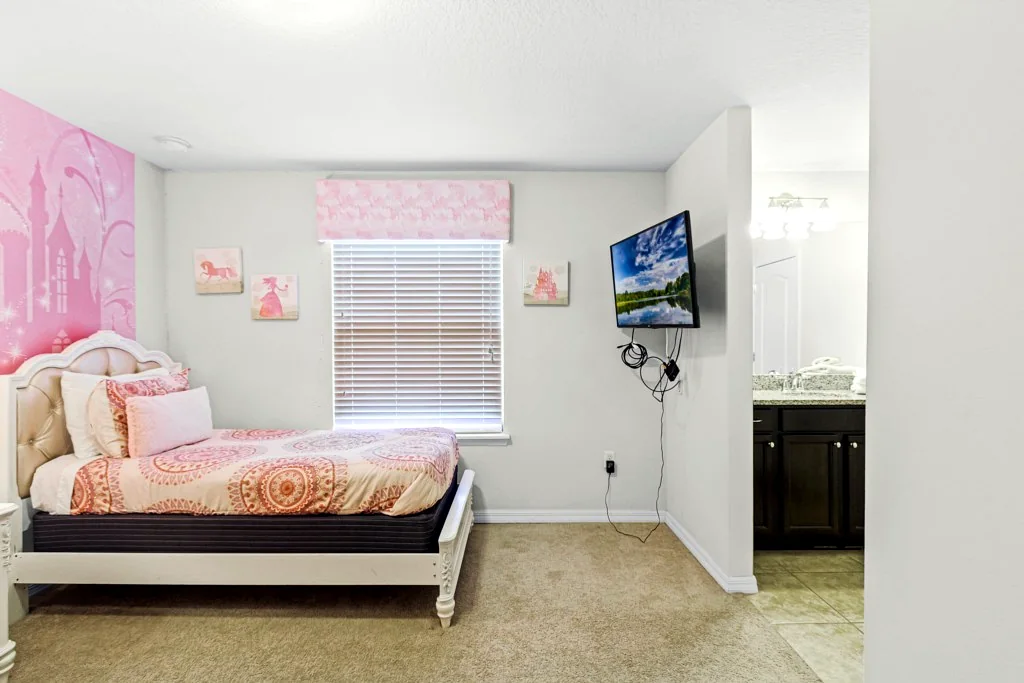 Blue bedroom with wood furniture